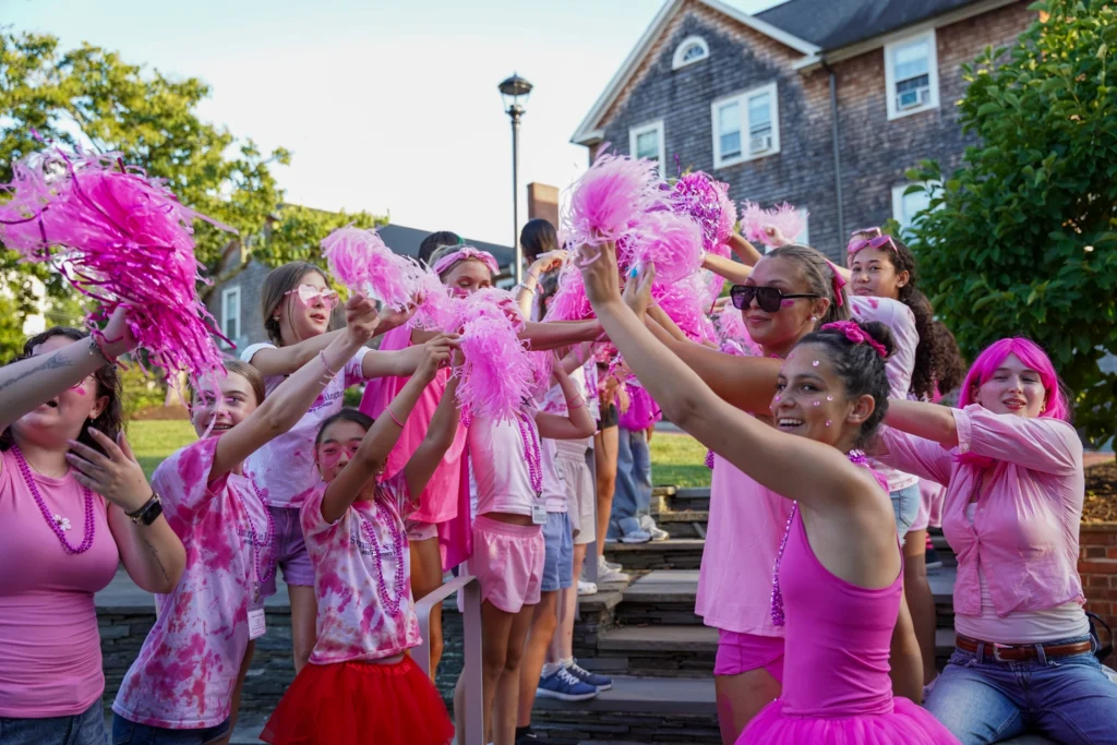 girls engaging in team and community building competitive games